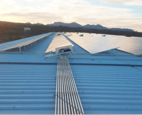 Rooftop solar panels generating energy | Solar Gain