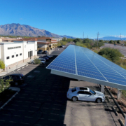 A solar carport providing shade to vehicles | Solar Gain